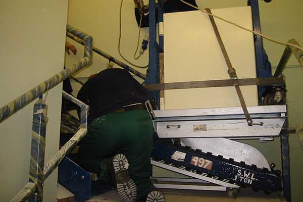Safe on Stairs Image Safe Movers at work with specialised equipment